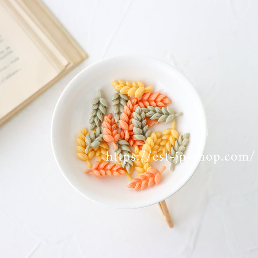 麦